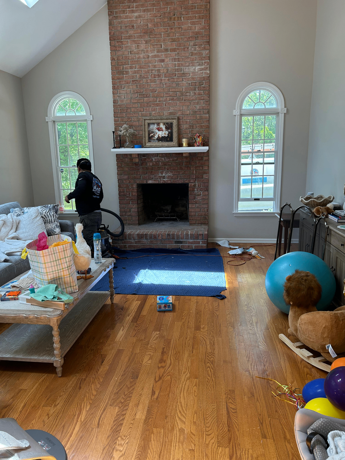 Chimney sweep technician inspecting fireplace chimney