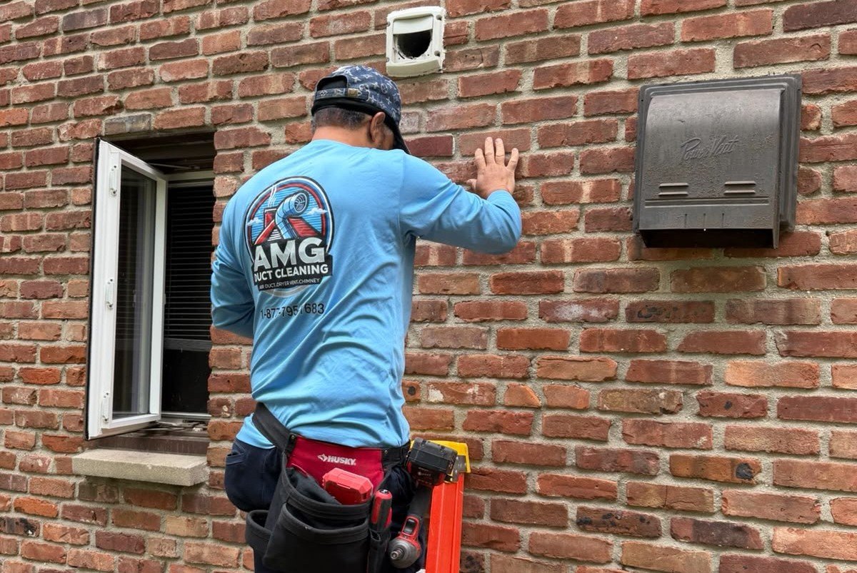 An AMG technician servicing a home in Mercer County
