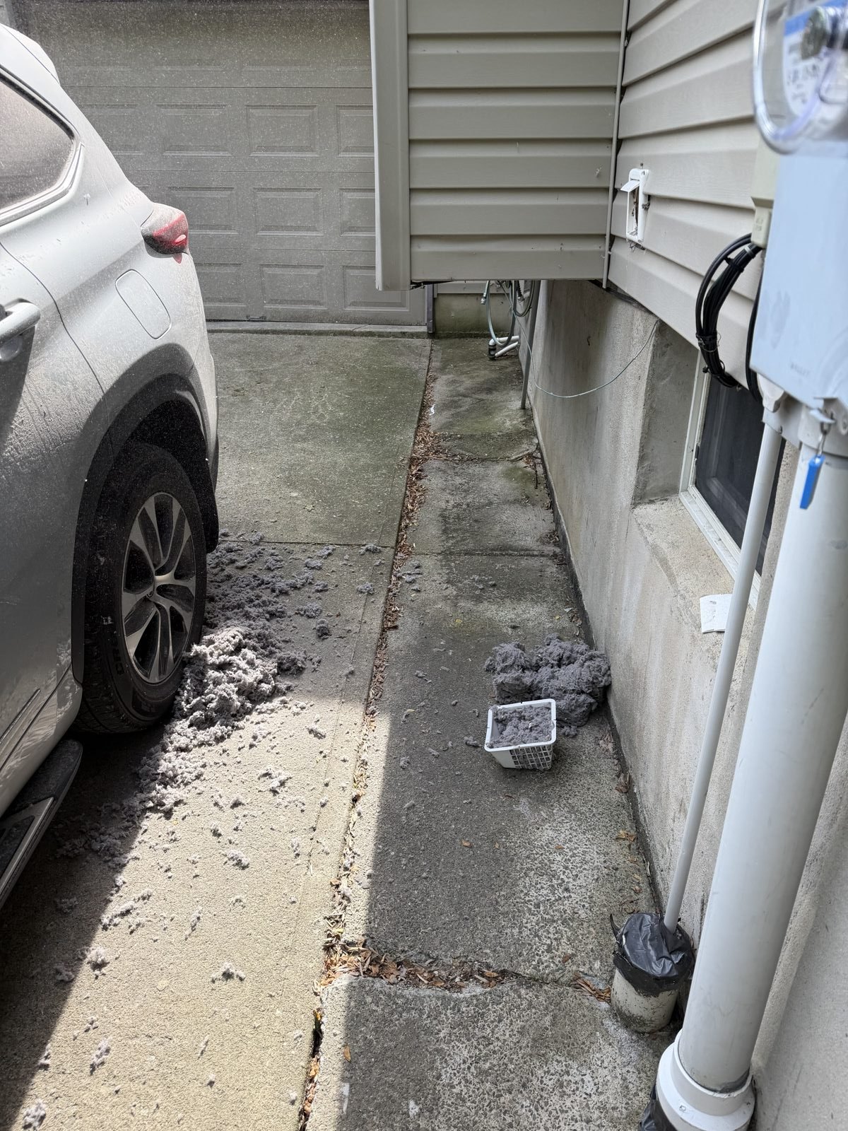 A laundry vent area before AMG cleaning. AMG at work for homes in Winfield, New Jersey.