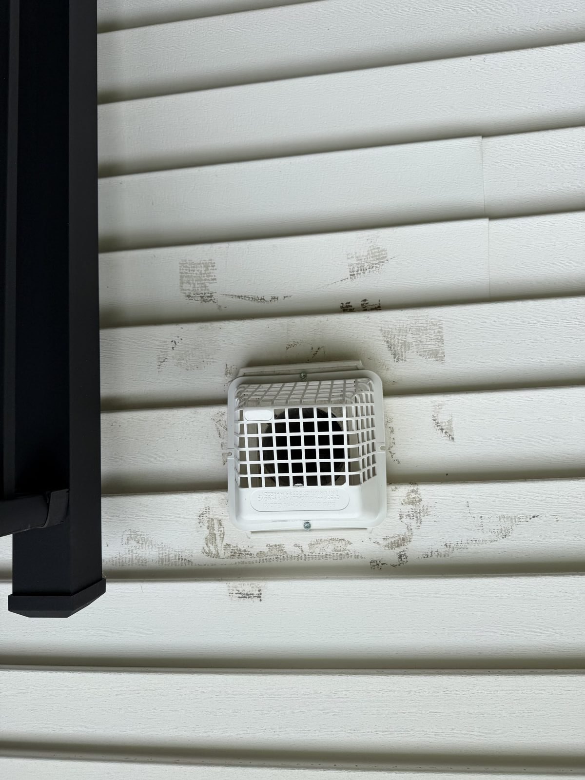 An exterior dryer vent cap on a New Jersey home. AMG at work for homes in Dover, New Jersey.