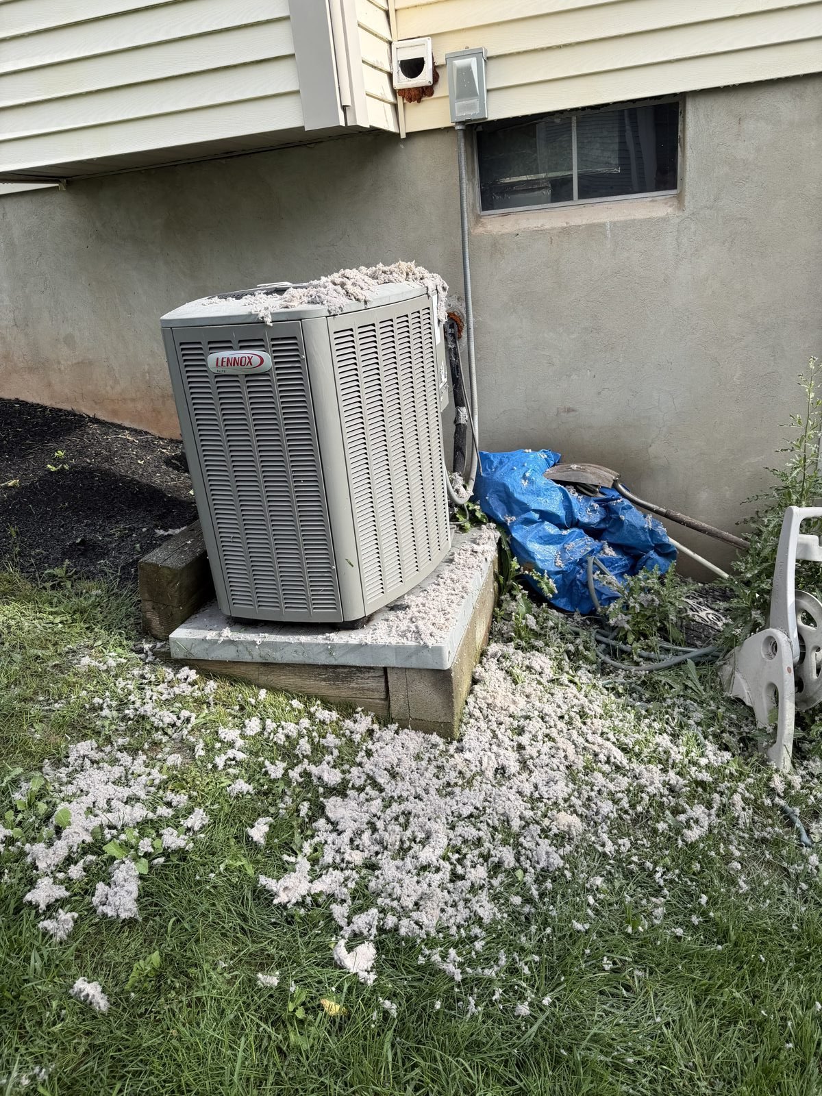 Lint cleared from an exterior vent unit. AMG at work for homes in Elizabeth, New Jersey.