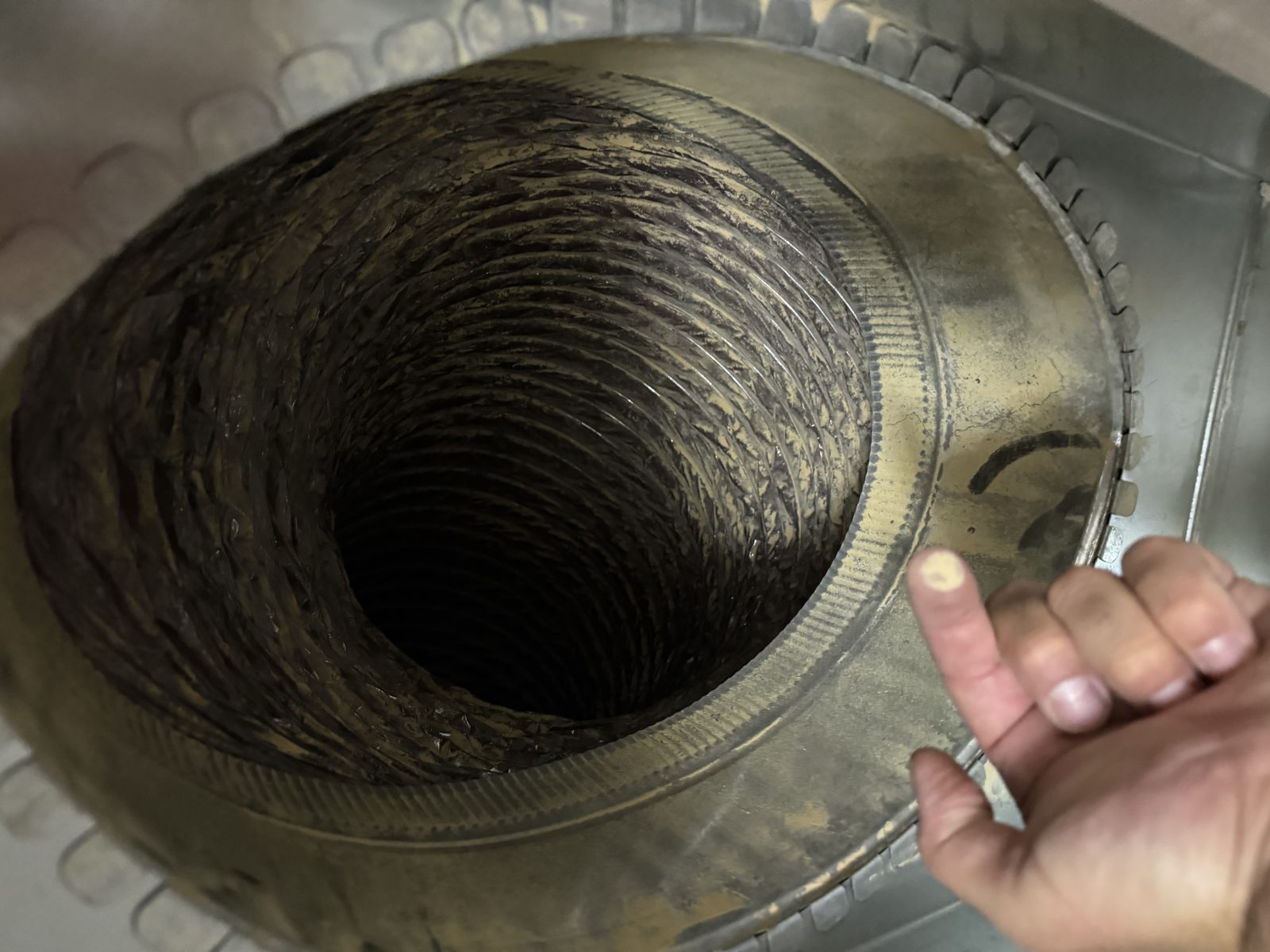 Inside a flexible duct before cleaning