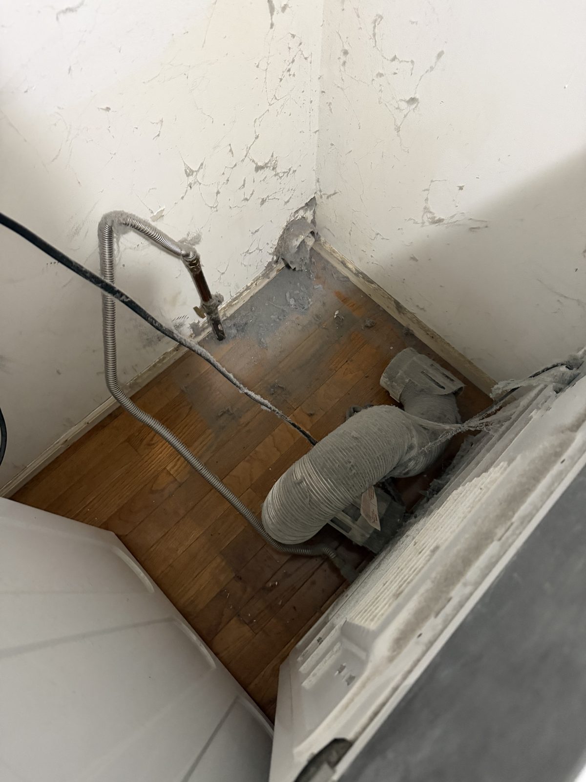 A dryer vent line serviced by AMG. AMG at work for homes in Asbury Park, New Jersey.