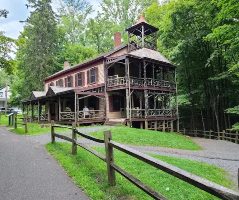 Wooden nature center surrounded by trees and trails at Watchung Reservation, a popular destination for hiking and nature walks in Union County, NJ.
